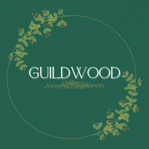 Guildwood logo in green - underneath the wordmark are green vines, encircled with green fruit-bearing vines.
